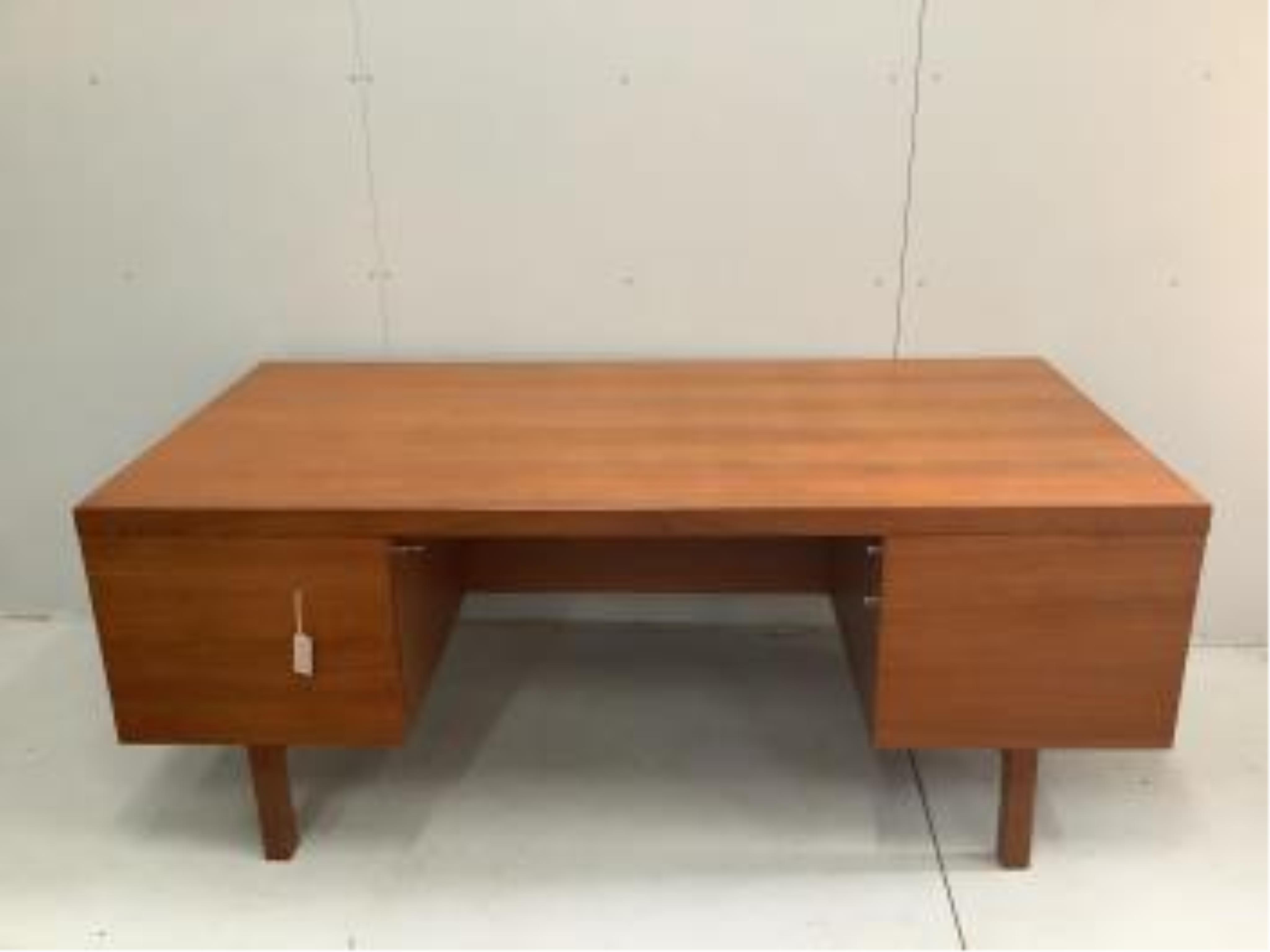 Alfred Cox, a mid century teak kneehole desk, width 183cm, depth 92cm, height 71cm. Condition - good